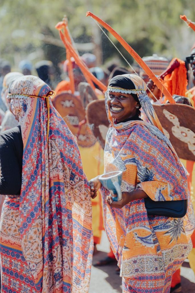 Vibrant outdoor celebration showcasing traditional African attire and culture.